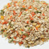 Muesli mix with oats, dried fruits, and nuts on a white background